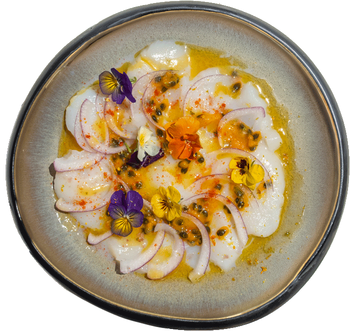 Carpaccio de vieires amb fruita de la passió
